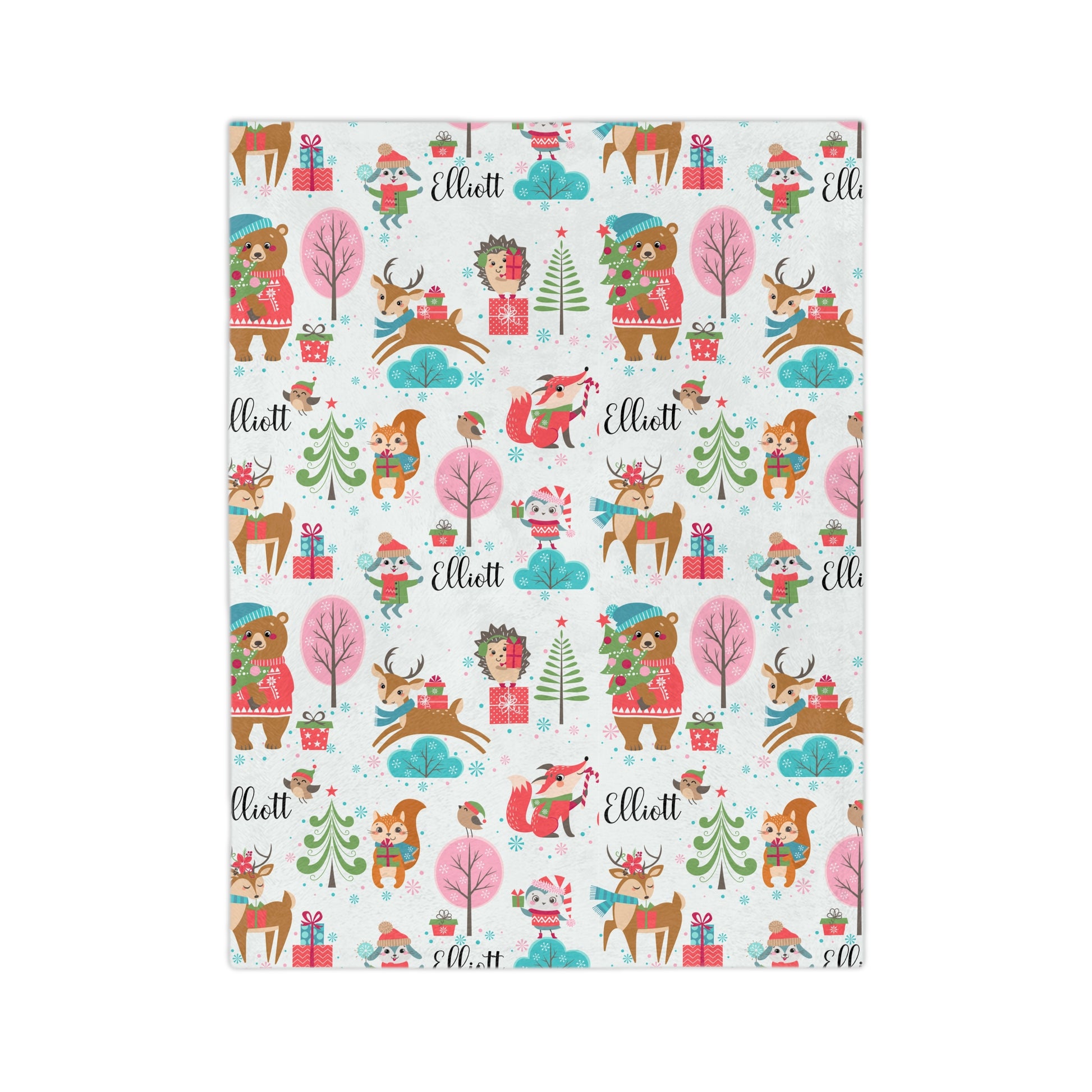 a sheet with animals and trees on it