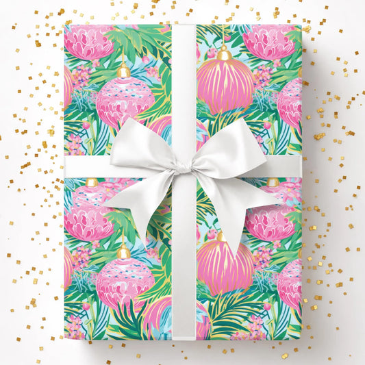 a present wrapped in a colorful wrapping paper with a white bow